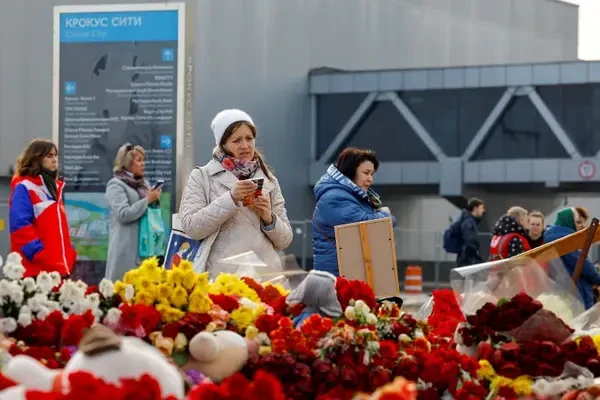 Russian intelligence chief says more than 20 people arrested following deadly concert attack