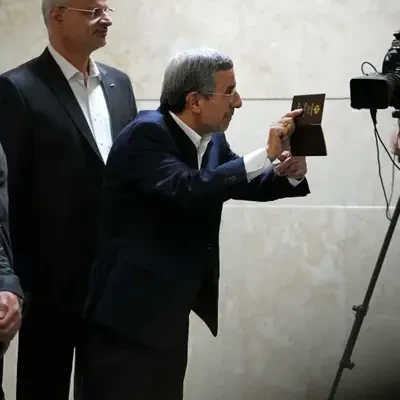 Iran’s ex-president Ahmadinejad, disqualified Larijani sign up for election